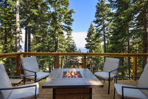 Balcony with lake & forest view, patio seating