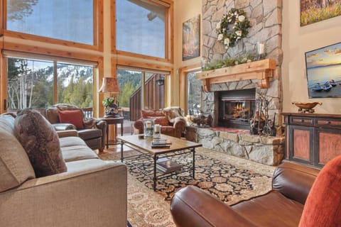 Living room with wood burning fireplace, Smart TV, DVD player