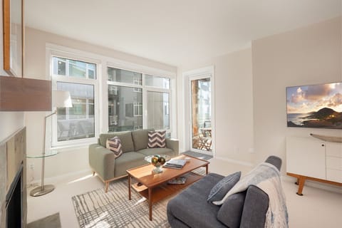 Living Room with fireplace and Smart TV