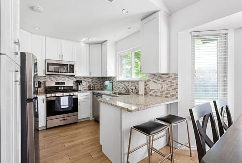 A cozy yet functional kitchen where delicious meals come to life. 🏡✨