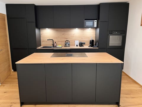 Cabinetry, Countertop, Kitchen Sink, Tap, Sink, Kitchen Appliance, Plumbing Fixture, Kitchen, Kitchen Stove, Wood