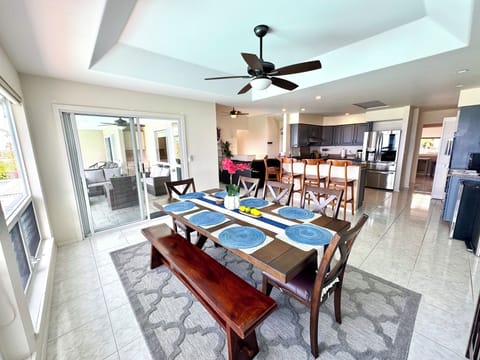 Spacious dinning area offering serene view of the pool & ocean