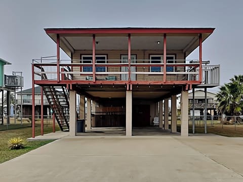 Front Exterior and Covered Parking