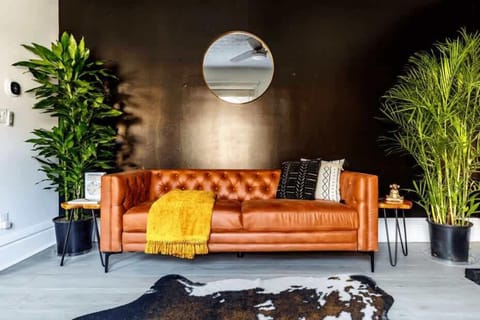 comfy couch, boho pillows & a great vibe ✨ your lounge zone awaits