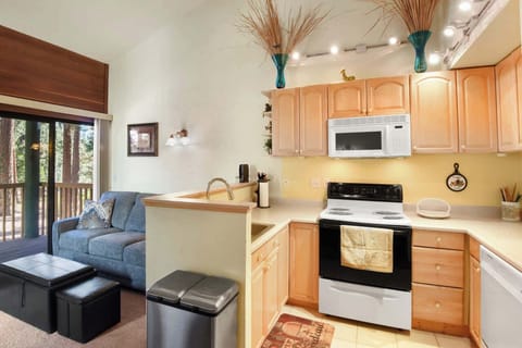 The open, airy kitchen offers ample space & all the comforts of home