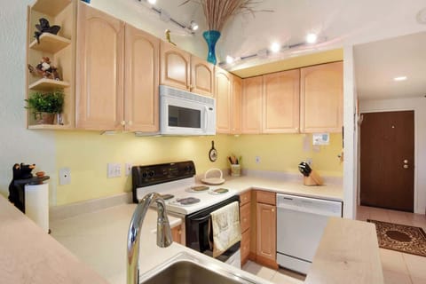 The open, airy kitchen offers ample space & all the comforts of home