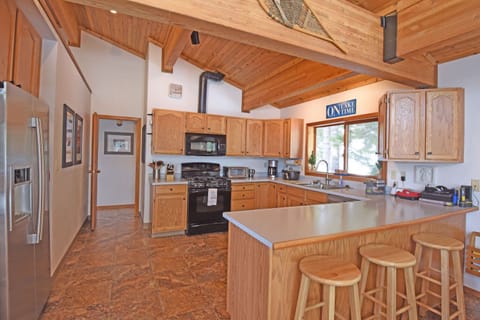 Enjoy home cooked meals in the fully equipped kitchen