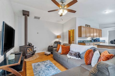 The woodstove warms up the place in the winter as you snuggle up on the family room couch for movie night! Just off the kitchen, on the opposite side of the house from the bedrooms, the activities in the family room won't disturb those sleeping.