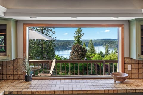 Kitchen View - Soak in the gorgeous lake views from the kitchen
