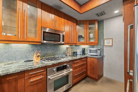 Full stainless steel kitchen with everything you need to make the perfect dinner.