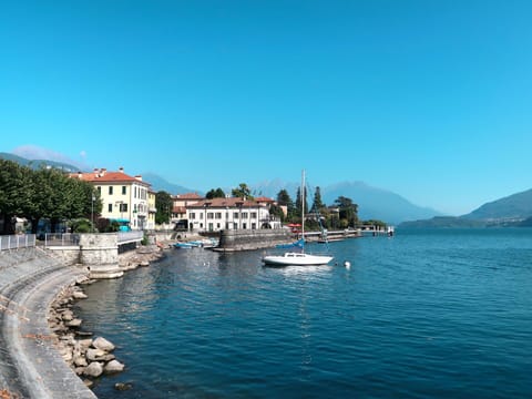 Sky, Mountainous Landforms, Mountain, Cloud, Hill, Coastal And Oceanic Landforms, Mountain Range, Coast, Hill Station, Lake