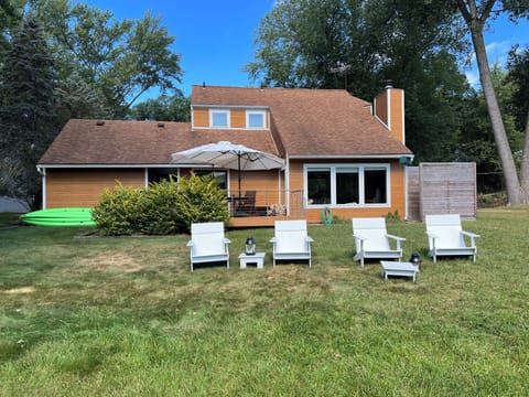 Back deck and chairs overlooking the pond