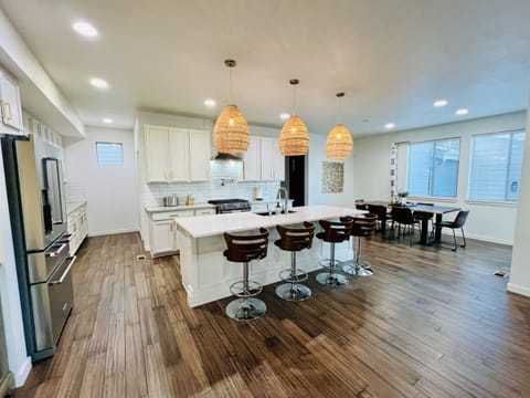 Large, well stocked Chefs Kitchen with open concept. 