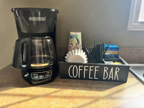 Coffee Bar stocked with local coffee and supplies for your use. 