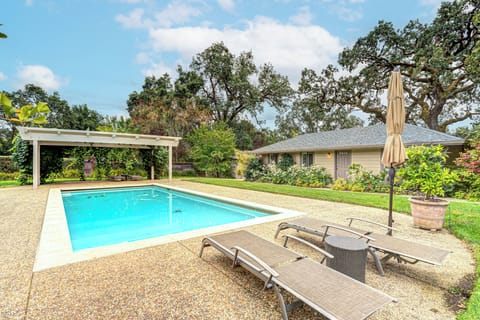 Pool desk from Guest House view. Cottage on right, Main House on left of pool.