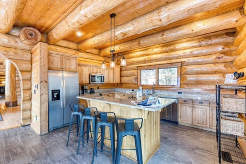 Barstool seating at the kitchen island.
