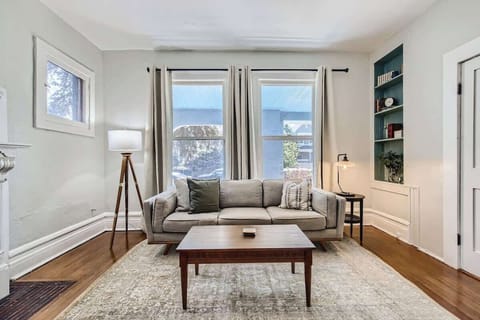 Two large windows bring lots of light to the living room