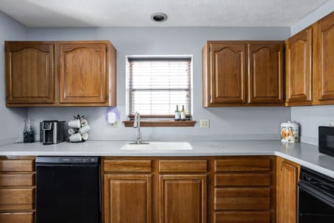 Our kitchen, with all of the cooking basics and supplies to start a family meal!