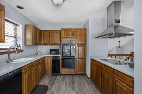 Our kitchen, with all of the cooking basics and supplies to start a family meal!