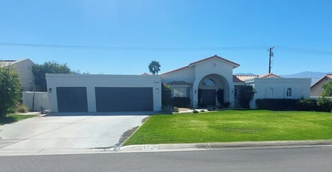 Large Front yard with 3 car garage