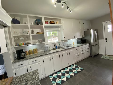 Clean and spacious galley kitchen with all you need to cook a meal