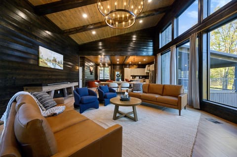 The magnificent living area looks straight out of an HGTV home - Guests will also enjoy the shuffleboard
