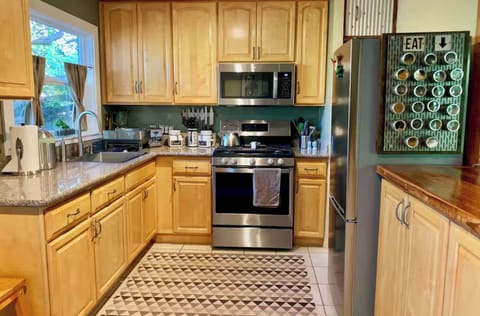 Gourmet kitchen is full stocked