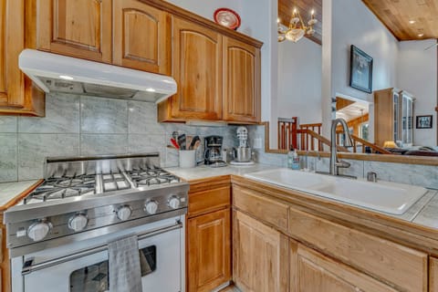 Kitchen: Crockpot, drip coffee maker, toaster oven, blender, dishwasher, cooking utensils, main floor