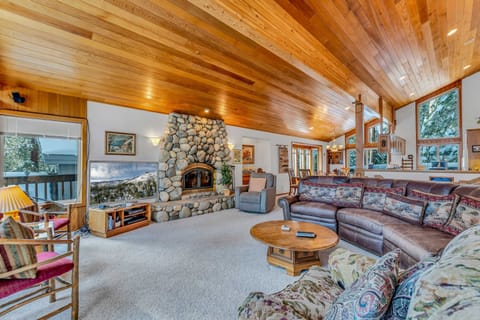 Living room: Smart TV, wood burning fireplace, central heating with no A/C, main floor