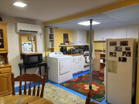 Full kitchen is equipped with everything you need to make a meal