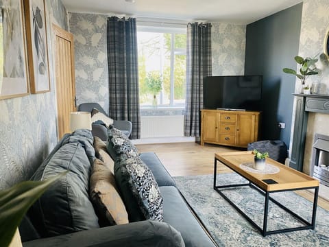 [Living room] Imagine yourself here relaxing with good conversation, friends, and a glass of wine!