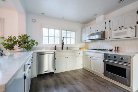 The kitchen is perfect for everything from quick breakfasts to gourmet meals.