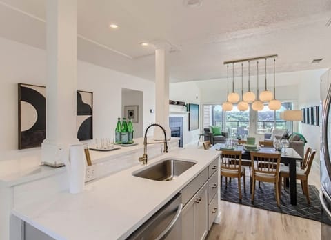 Kitchen island with view out of open floor plan.