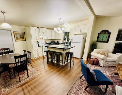 Open-floor concept for congregating in the living room, dining room and kitchen.