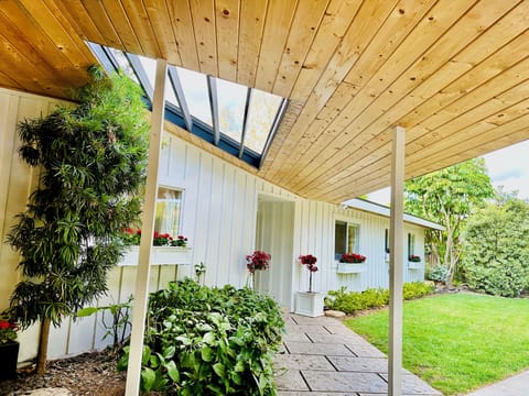 Mid century main house on one acre.