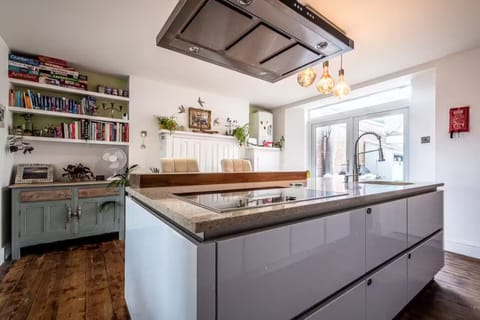 Direct access to the garden through the patio doors, ideal for outdoor dining