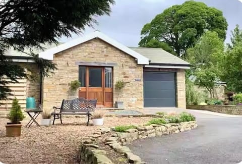 The front elevation and parking area