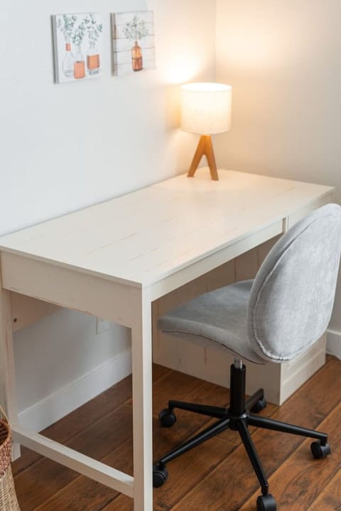 Bright desk and stylish chair invite inspiration in sunny Phoenix!