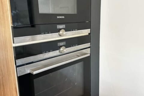 Well equipped kitchen. With two washing machines and a dryer