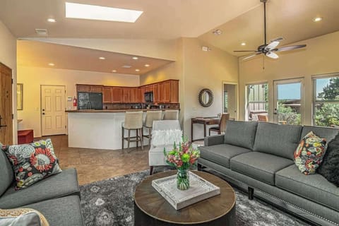 Lounge area with extra dining at the bar, office desk and fully loaded kitchen.