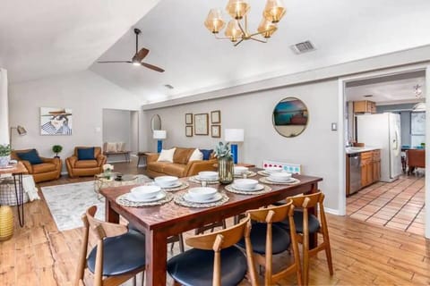 Open concept dining room that opens to the kitchen, living room, and deck.