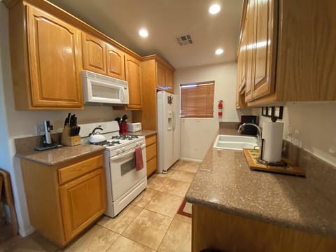 Kitchen Amenities: Stove, oven, dish washer, refrigerator, microwave and more