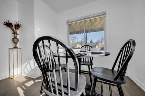 Dining table for 4. 2 Extra chairs are in the basement.