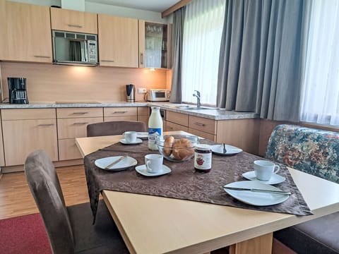 Furniture, Interior Design, Floor, Flooring, Home, Apartment, Room, Comfort, Chair, Kitchen & Dining Room Table