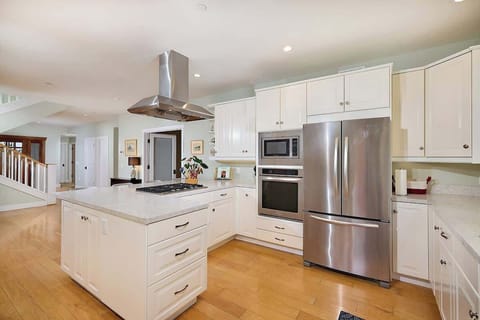 Fully stocked open chefs kitchen 