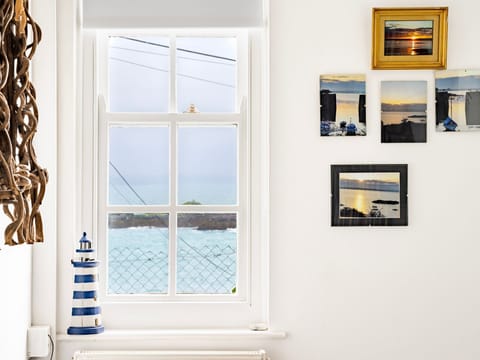 Sea views from sunny hallway 
