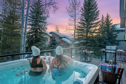 Soak at sunset as you ease sore muscles after skiing. The perfect days end!
