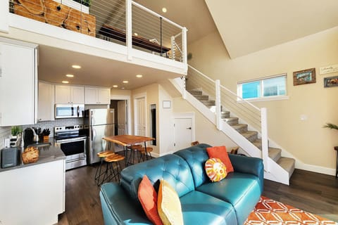 Sit and watch the ocean in this sunny cottage.