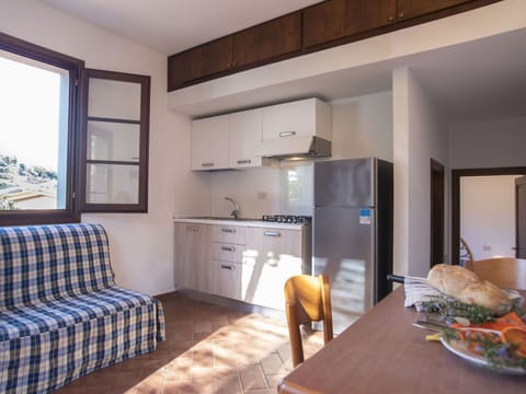 Furniture, Apartment, Kitchen & Dining Room Table, Chair, Wood Stain, Shade, Balcony, Design, Hardwood, Coffee Table