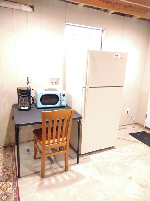 micro, fridge, coffee pot in basement bed area